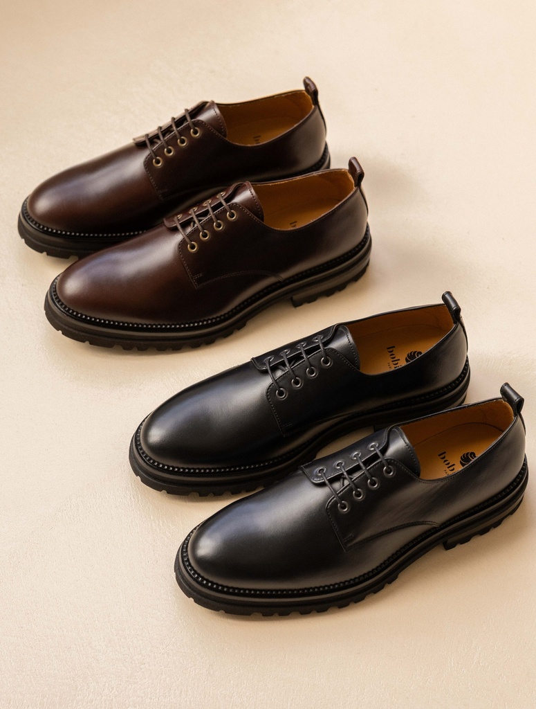 Men's brown pull-up leather derbies with notched rubber sole